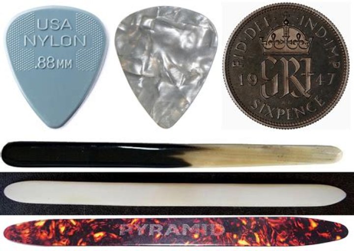 Does brian may use a plectrum?