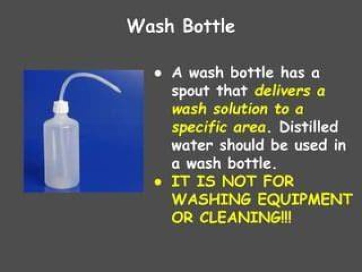 Has a spout that delivers a wash solution?