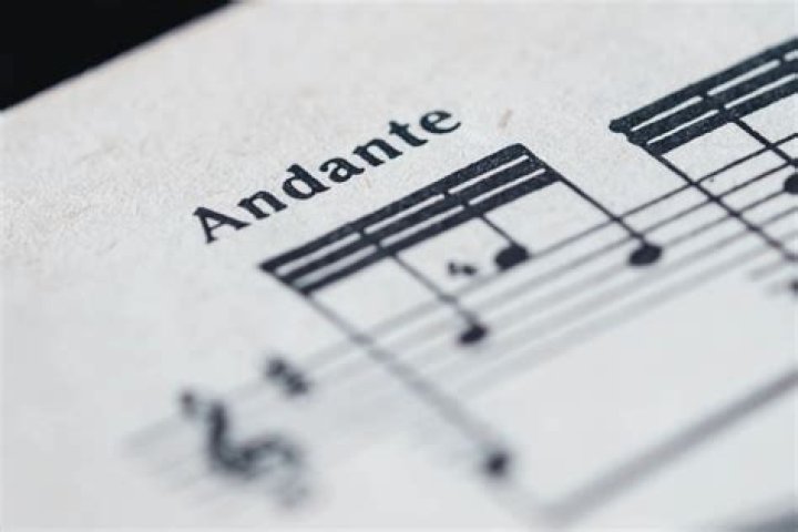 How does andante mean in music?