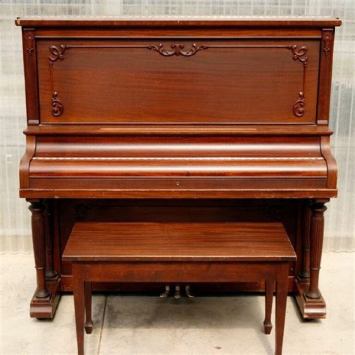 How much does a spinet piano weigh?