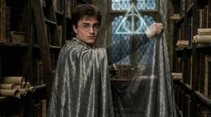 Who gave invisible cloak to harry potter?