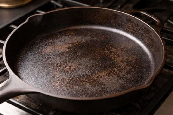 Why is my cast iron black when i wipe?